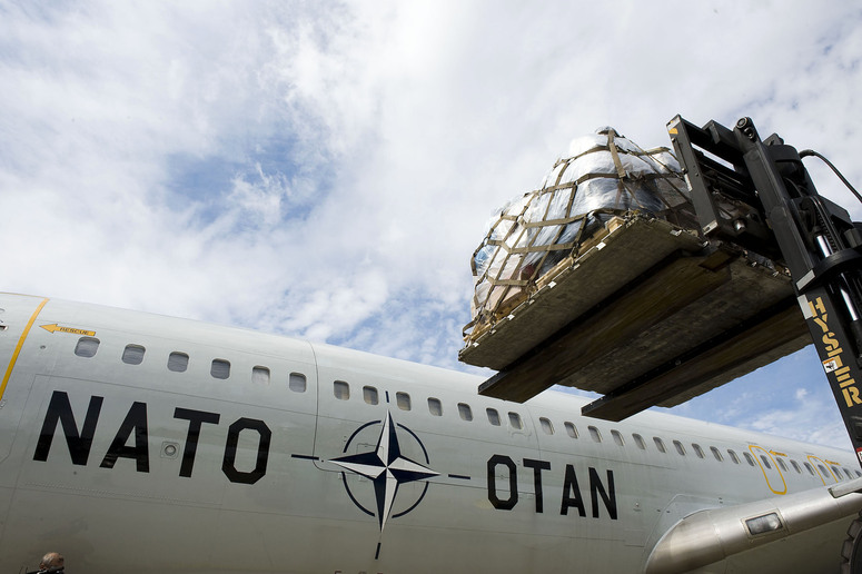 A Trainer Cargo Aircraft of the NATO Airborne Early Warning and Control Force (AWACS) ready to transport relief goods to Pakistan