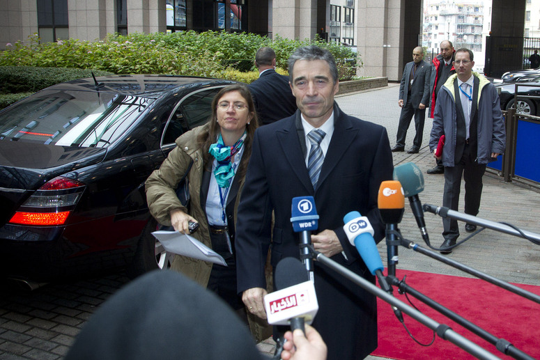 NATO Secretary General Anders Fogh Rasmussen briefly addresses the press before attending a meeting of the European Union Foreign Affairs Council in the format of Defence Ministers