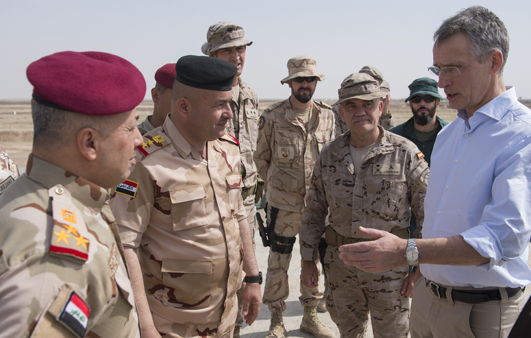 NATO Secretary General Jens Stoltenberg views NATO Training Camp Base-Iraq activities at Camp Besmaya, Iraq, March 5, 2018. Stoltenberg greeted NATO trainers and Iraqi troops while touring the facilities