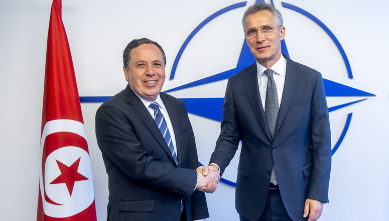 NATO Secretary General Jens Stoltenberg welcomes Khemaies Jhinaoui, Minister of Foreign Affairs of Tunesia