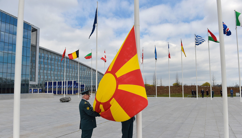 Flag raising ceremony to mark the accession of North Macedonia to NATO with remarks by NATO Secretary General Jens Stoltenberg and the Chargé d'Affaires of the Delegation of North Macedonia to NATO, Zoran Todorov