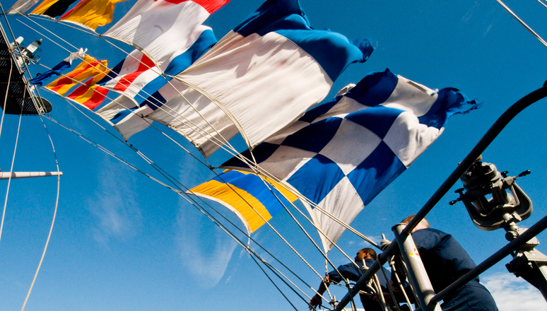 Standardization allows different countries to work with each other using well-established and familiar tools, like these maritime signal flags aboard the aircraft carrier USS George Washington. (US Navy photo by Petty Officer 3rd Class Danielle A. Brandt)