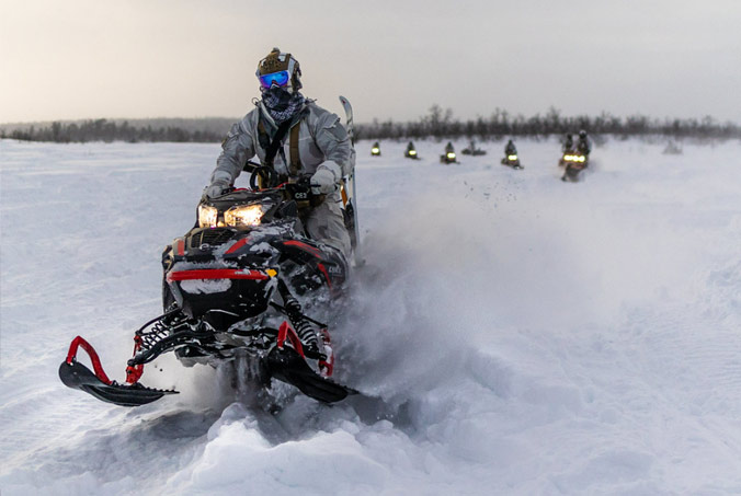 US Army Special Forces soldiers navigate the deep snow of the Swedish Arctic ahead of exercise Cold Response 22, a Norwegian-led multinational exercise that helps NATO Allies train for military operations in the High North. Photo by NATO photographer.