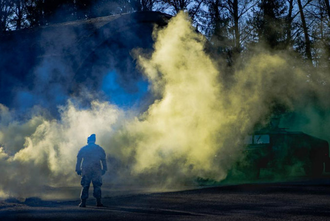 A US Air Force staff sergeant sets up the training area for participants in a tactical leadership course held at Ramstein Air Base, Germany. US Air Force photo by Airman 1st Class Alexcia Givens.