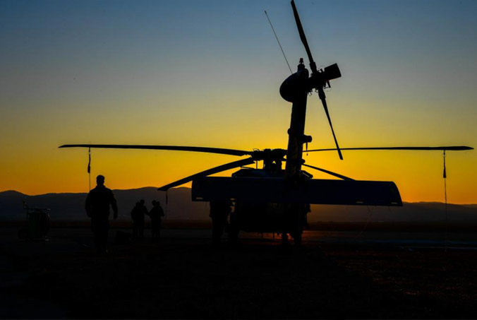 A US Air Force HH-60G Pave Hawk helicopter undergoes post-flight checks in Romania. The helicopter's crew provide search-and-rescue capabilities for NATO Allies and conduct joint training missions with the Romanian Air Force. US Air Force photo by Senior Airman Noah Sudolcan.