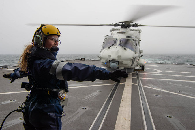 A helicopter sits on the flight deck of the Royal Netherlands Navy's HNLMS De Zeven Provinciën during exercise Dynamic Mongoose, an annual anti-submarine and anti-surface warfare exercise held every summer in the Atlantic Ocean or the Norwegian Sea. The 2022 exercise included sailors and air personnel from nine NATO Allies: Canada, Denmark, France, Germany, the Netherlands, Norway, Portugal, the United Kingdom and the United States. Allied Maritime Command photo by WO Stephane Dzioba (FRA N).