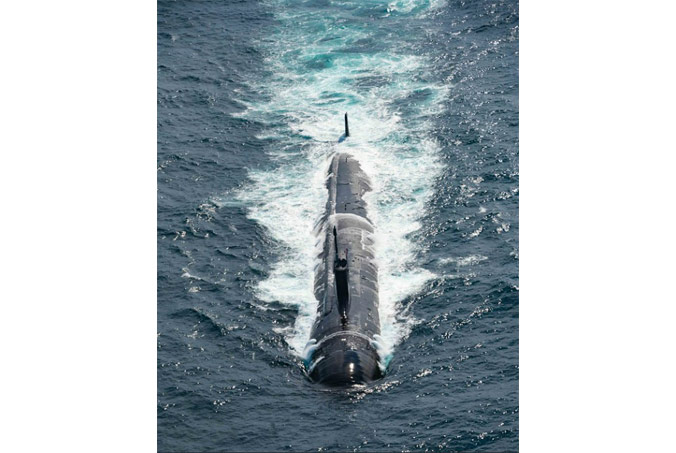 The USS John Warner surfaces as part of exercise Dynamic Mongoose, an annual anti-submarine and anti-surface warfare exercise held every summer in the Atlantic Ocean or the Norwegian Sea. Photo by Pte Connor Bennett, Canadian Armed Forces Imagery Technician.