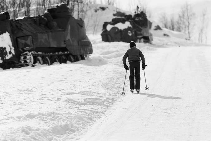 Kid skiing by during Avalanche Express