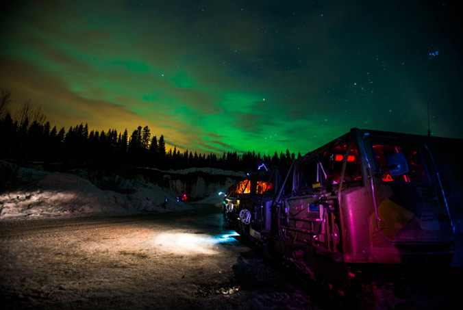 Cold Response 16 Norway vehicles under aurora