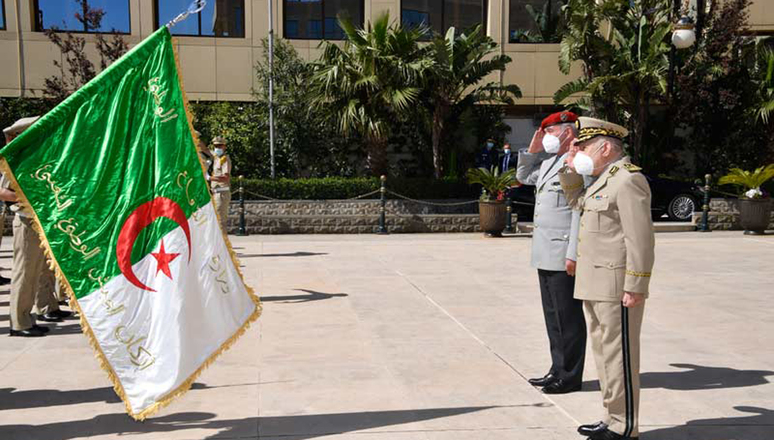 Director General of the International Military Staff Lieutenant General Hans-Werner Wiermann and the Chief of Defence of Algeria Lieutenant General Saïd Chanegriha salute the Algerian flag.