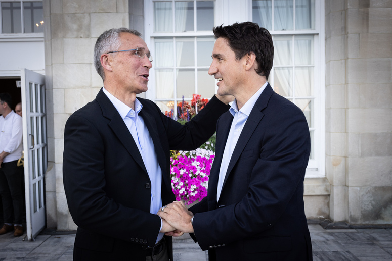 NATO Secretary General Jens Stoltenberg and the Prime Minister of Canada Justin Trudeau meeting in the garden of Fairmont Hotel Macdonald