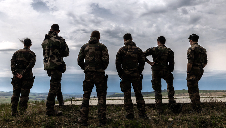 French soldiers observe a live-fire exercise at the new NATO multinational battlegroup in Romania, where they are working alongside their Polish and Romanian counterparts.