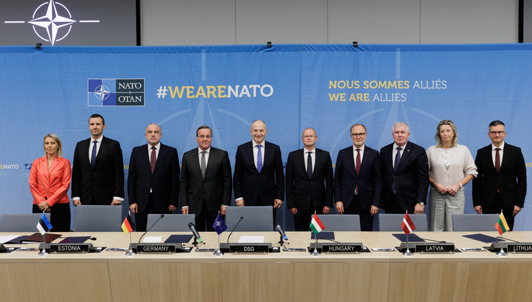 Left to right: Ludivine Dedonder (Minister of Defence, Belgium); unknown; Juri Luik (NATO Permanent Representative, Estonia); Boris Pistorius (Minister of Defence, Germany); NATO Deputy Secretary General Mircea Geoană; unknown; Andris Sprūds (Minister of Defence, Latvia); Arvydas Anušauskas (Minister of Defence, Lithuania); Kajsa Ollongren (Minister of Defence, The Netherlands); Marjan Šarec (Minister of Defence, Slovenia)