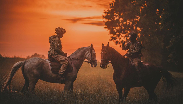 24  July 2023 - NATO’s photo of the year for 2023: The British Army’s Royal Lancers (Queen Elizabeths’ Own) take part in Operation Cabrit, the UK operational deployment to Estonia, where UK troops are leading a NATO multinational battlegroup. Pictured here: the Royal Lancers get back to their cavalry heritage by conducting mounted armoured reconnaissance with the Polish Territorial Defence Force’s 2nd Lubelska (Lublin) Brigade. Credit: The Royal Lancers, British Army