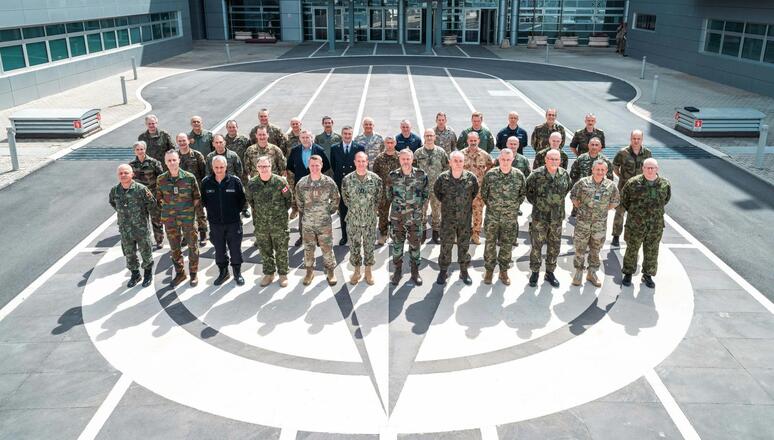 The NATO Military Committee accompanied by Admiral Stuart Munsch, Commander Joint Force Command Naples.