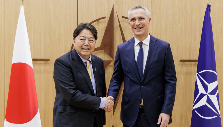 Left to right: Yoshimasa Hayashi (Minister of Foreign Affairs, Japan) with NATO Secretary General Jens Stoltenberg