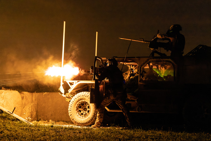 A US Army Green Beret fires an M240 machine gun during a live-fire exercise with UK Royal Marines at Grafenwöhr Training Area in Germany, Sept. 22, 2022. (US Navy photo by LT Rob Kunzig)