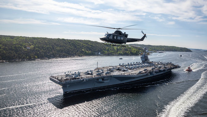 The USS Gerald R. Ford sails out of the Oslo Fjord in Norway in May 2023. (Photo: Norwegian Armed Forces)