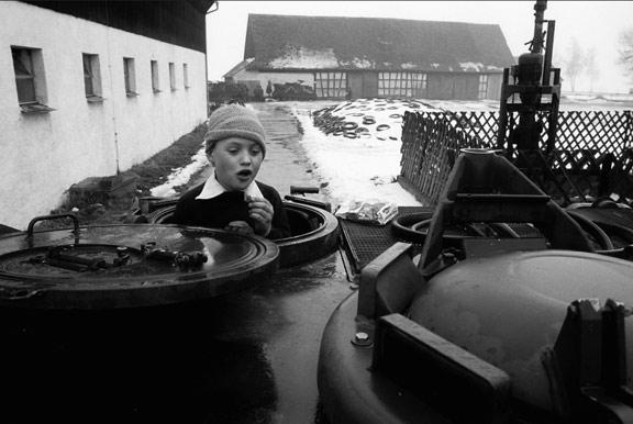 1979 - Kid eating chocolates in a tank during exercise Certain Sentinel, part of Reforger 79 in Germany