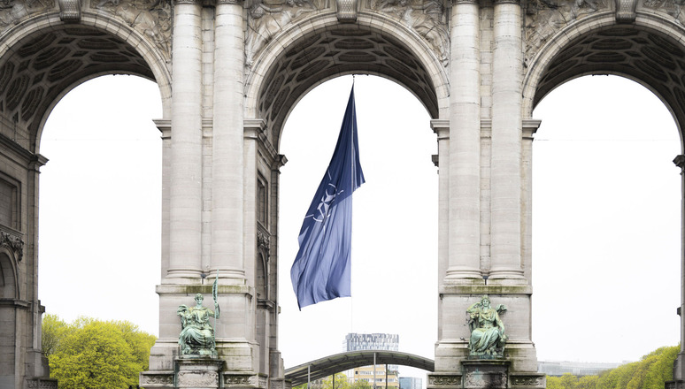 Monuments throughout the Brussels are marking NATO's anniversary. In Parc du Cinquantenaire, the NATO flag is flying under the Memorial Arch