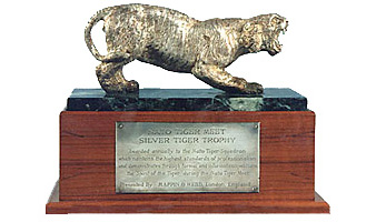 The Silver Tiger Trophy started at the 1977 NATO Tiger Meet in Greenham Common station, United Kingdom. It was gifted to the tiger community by the London silversmith Mappin & Webb on request of the director of the Royal Air Force Benevolent Fund. It became a tradition to award it during the Tiger Meets and the winner would be able to keep it until the next edition of the gathering, as well as to add a silver tag with the date the unit had won it. (Photo by NATO Tiger Association)