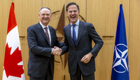 NATO Secretary General meets with the Minister of Defence of Canada - Meeting of NATO Ministers of Defence, Brussels  