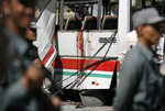 Afghan police keep watch at the site of a blast in Kabul, 38.13KB