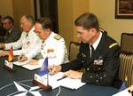 100624-act-mou.jpg, 61.32KB